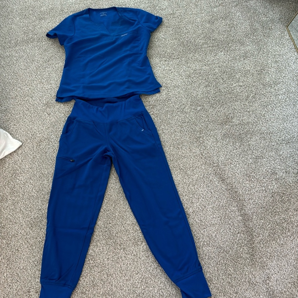 Jaanuu scrubs.